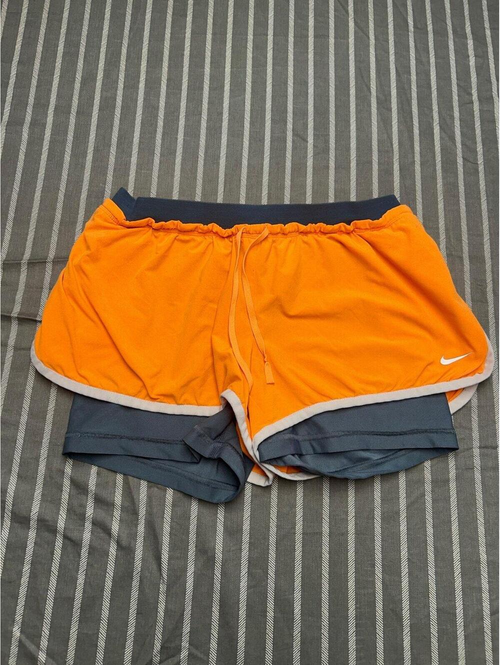 Womens Nike Dri-FIT Tempo running shorts featuring a 2-in-1 design size M